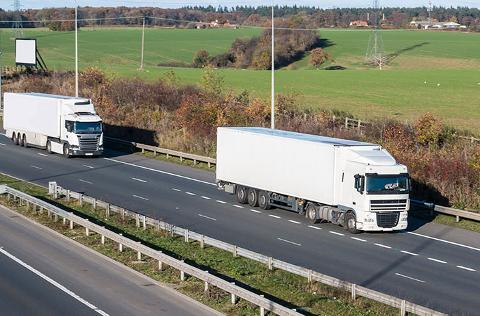 two Haulage lorry's on the road in Purefleet